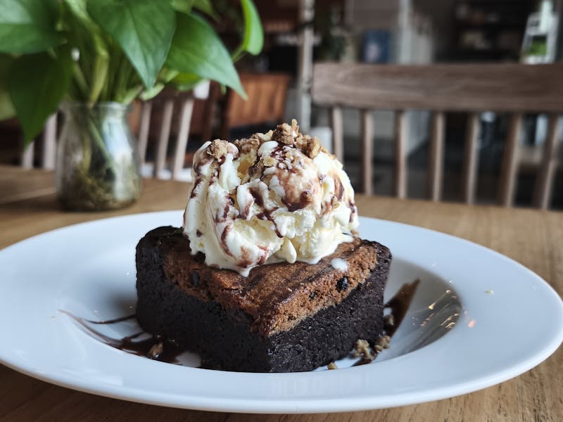 Chocolate brownie with ice cream scoop